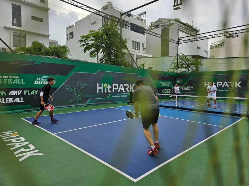 Indoor courts at Hyprground in Petaling Jaya featuring VIP lounges and view of playing area within the converted warehouse space.