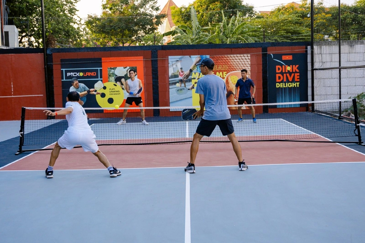 Indoor courts at Hyprground in Petaling Jaya featuring VIP lounges and view of playing area within the converted warehouse space.