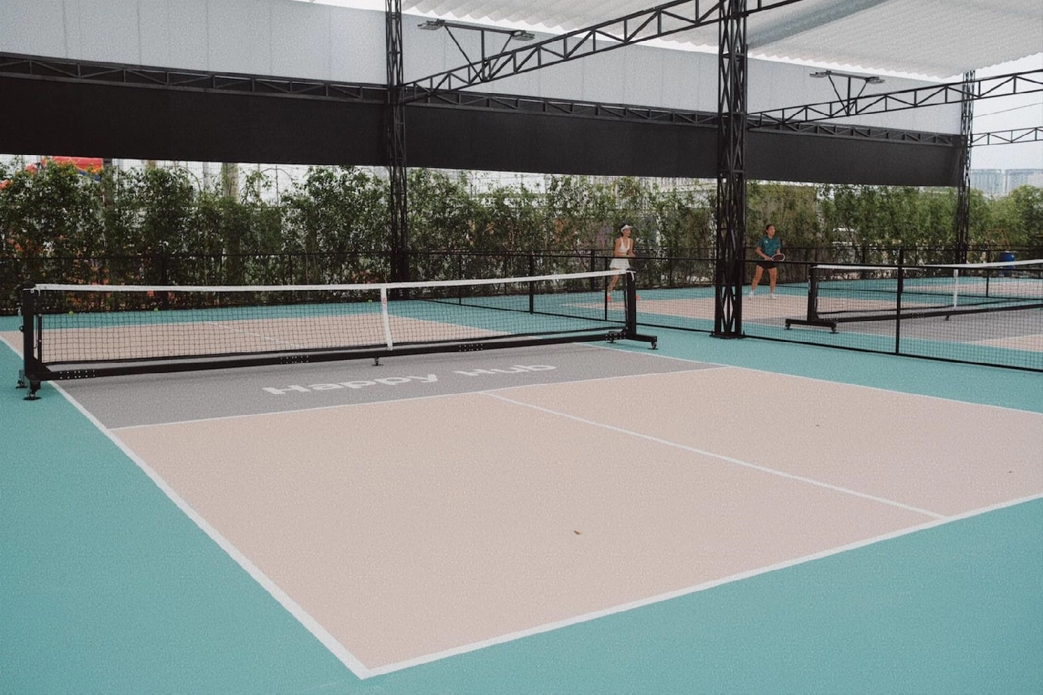 Indoor courts at Hyprground in Petaling Jaya featuring VIP lounges and view of playing area within the converted warehouse space.