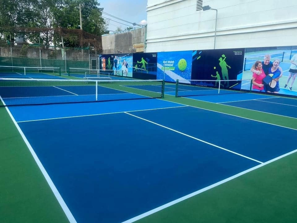 Indoor courts at Hyprground in Petaling Jaya featuring VIP lounges and view of playing area within the converted warehouse space.