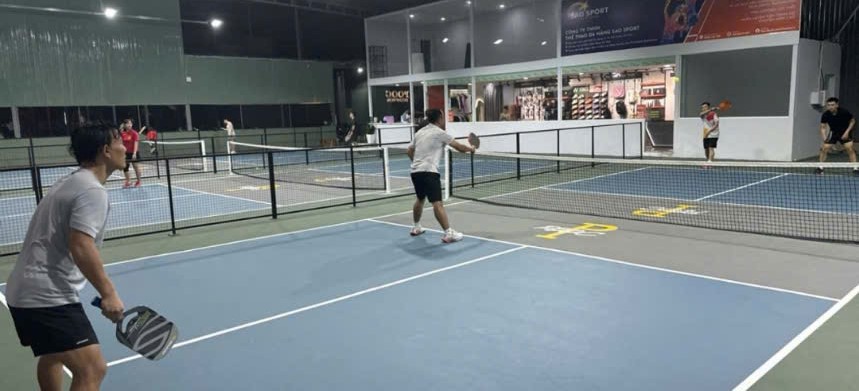 Indoor courts at Hyprground in Petaling Jaya featuring VIP lounges and view of playing area within the converted warehouse space.