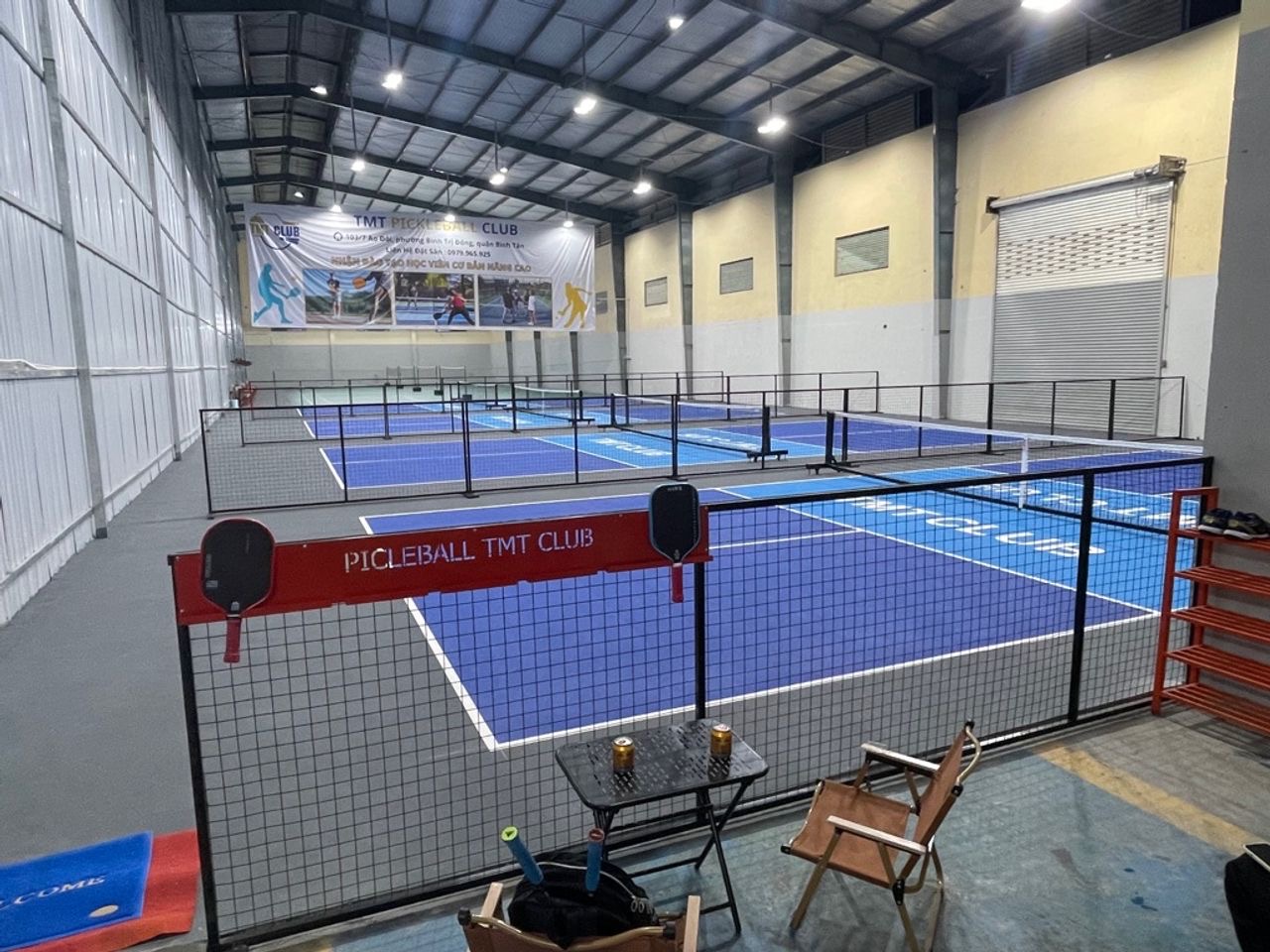 Indoor courts at Hyprground in Petaling Jaya featuring VIP lounges and view of playing area within the converted warehouse space.