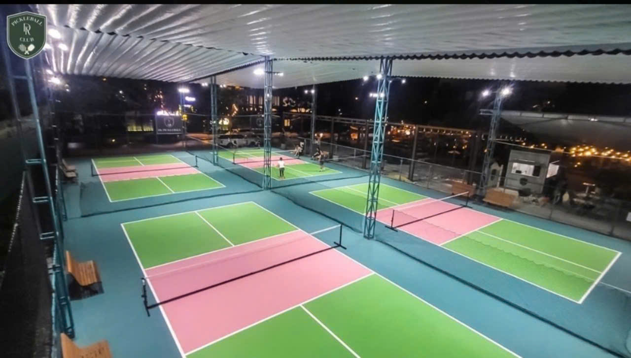 Indoor courts at Hyprground in Petaling Jaya featuring VIP lounges and view of playing area within the converted warehouse space.