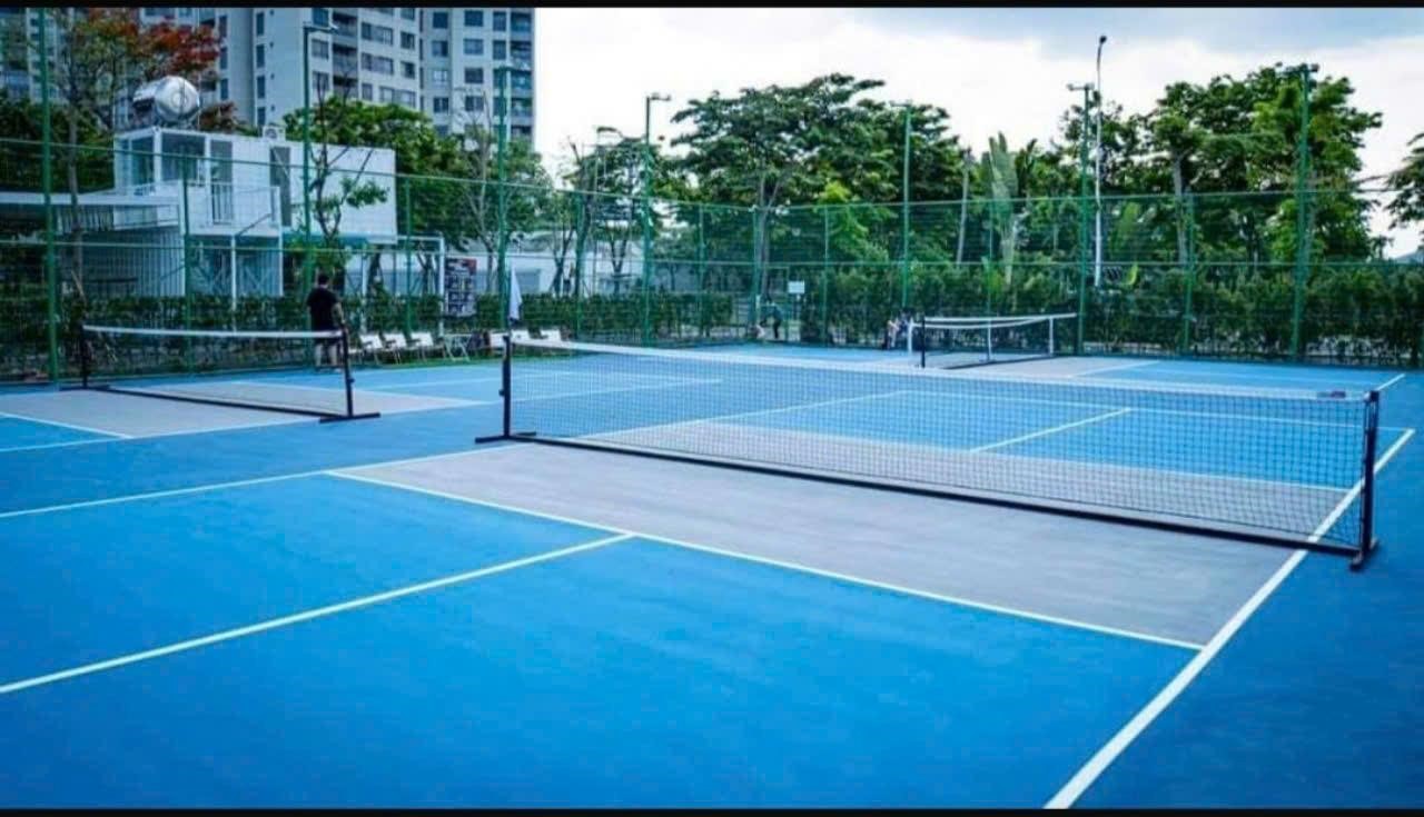 Indoor courts at Hyprground in Petaling Jaya featuring VIP lounges and view of playing area within the converted warehouse space.