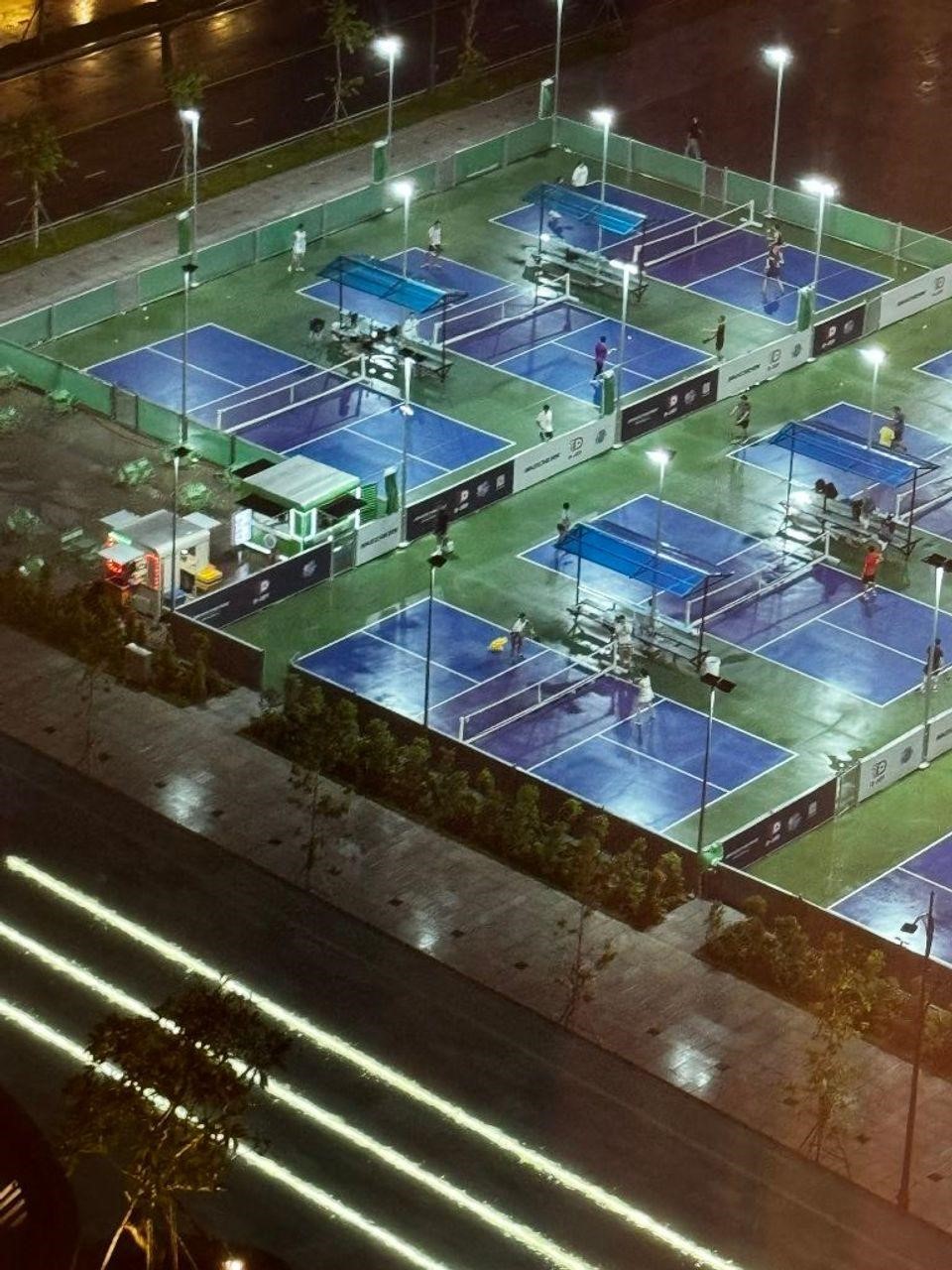 Indoor courts at Hyprground in Petaling Jaya featuring VIP lounges and view of playing area within the converted warehouse space.