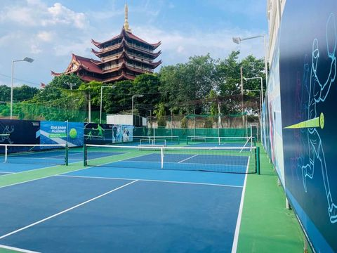 Indoor courts at Hyprground in Petaling Jaya featuring VIP lounges and view of playing area within the converted warehouse space.