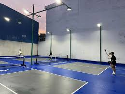 Indoor courts at Hyprground in Petaling Jaya featuring VIP lounges and view of playing area within the converted warehouse space.