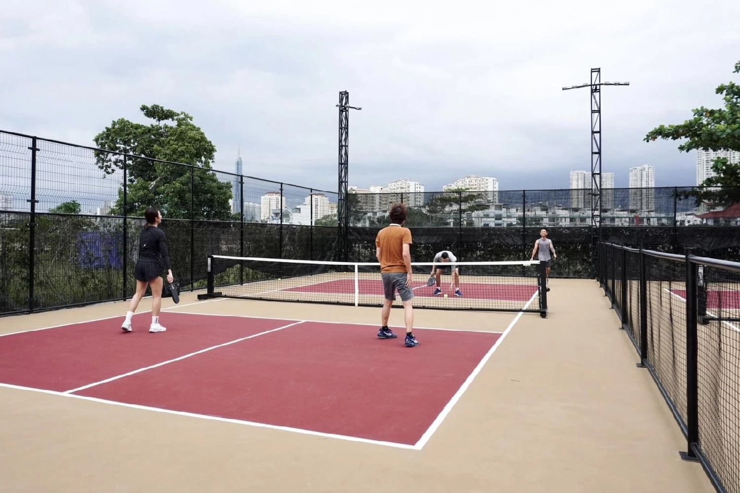 Indoor courts at Hyprground in Petaling Jaya featuring VIP lounges and view of playing area within the converted warehouse space.