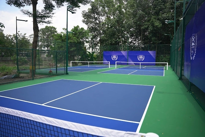 Indoor courts at Hyprground in Petaling Jaya featuring VIP lounges and view of playing area within the converted warehouse space.