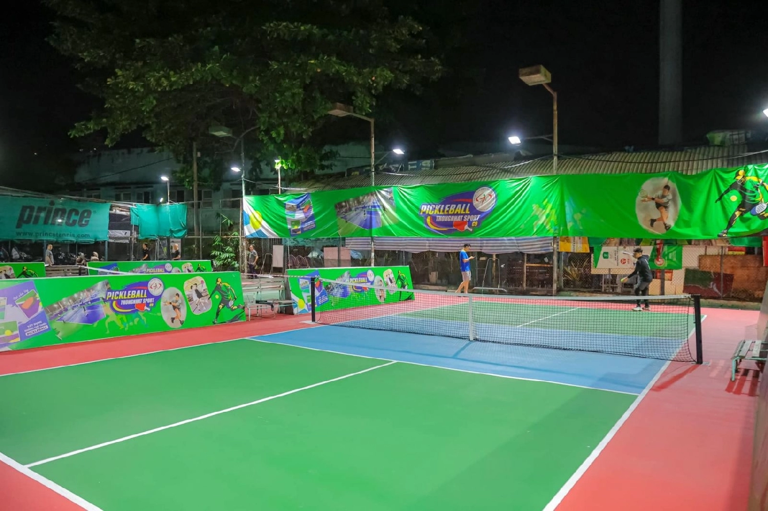 Indoor courts at Hyprground in Petaling Jaya featuring VIP lounges and view of playing area within the converted warehouse space.