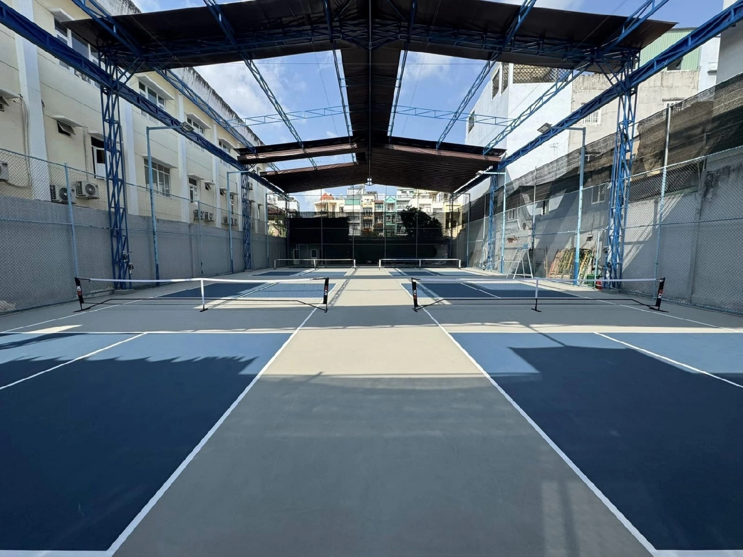 Indoor courts at Hyprground in Petaling Jaya featuring VIP lounges and view of playing area within the converted warehouse space.