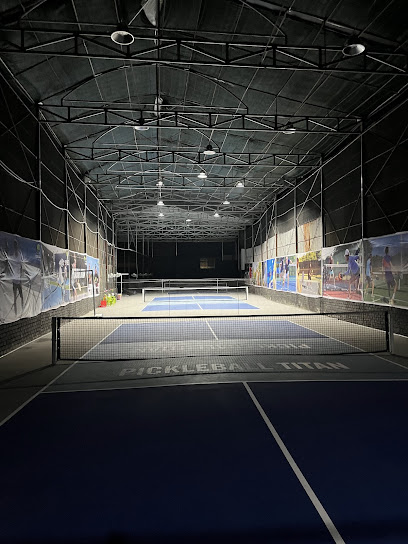 Indoor courts at Hyprground in Petaling Jaya featuring VIP lounges and view of playing area within the converted warehouse space.