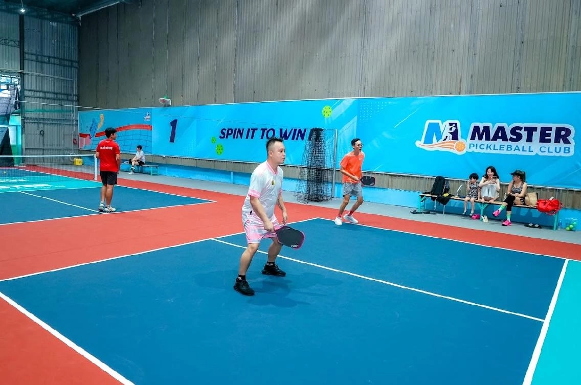 Indoor courts at Hyprground in Petaling Jaya featuring VIP lounges and view of playing area within the converted warehouse space.