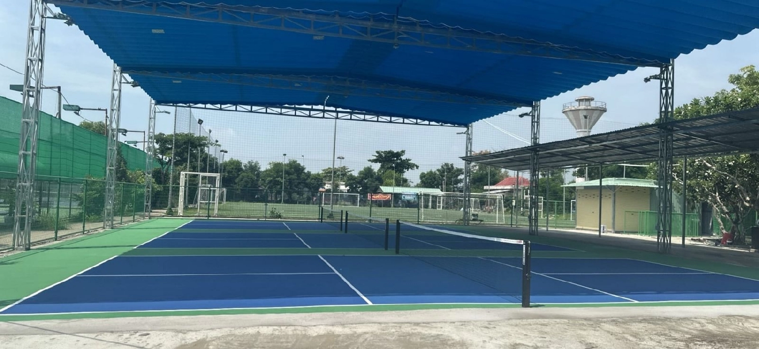 Indoor courts at Hyprground in Petaling Jaya featuring VIP lounges and view of playing area within the converted warehouse space.