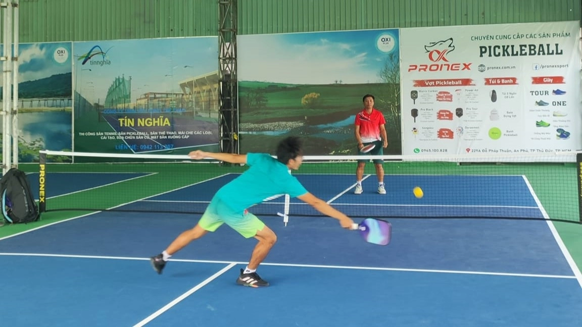 Indoor courts at Hyprground in Petaling Jaya featuring VIP lounges and view of playing area within the converted warehouse space.