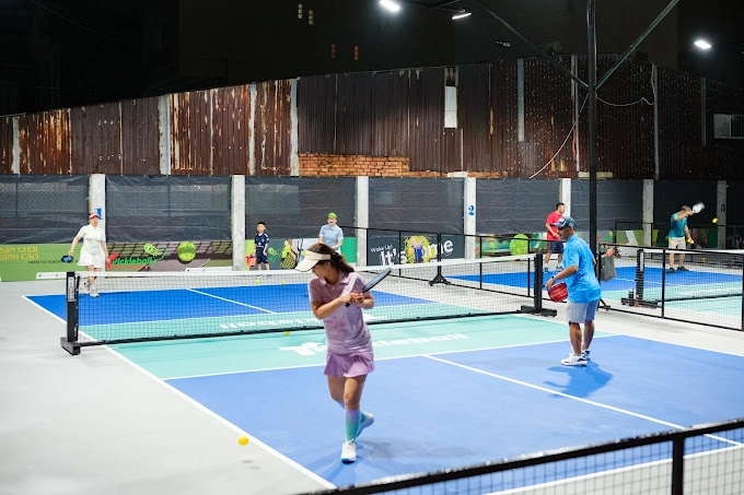 Indoor courts at Hyprground in Petaling Jaya featuring VIP lounges and view of playing area within the converted warehouse space.