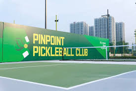 Indoor courts at Hyprground in Petaling Jaya featuring VIP lounges and view of playing area within the converted warehouse space.